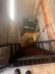Steep staircase inside the abandoned building